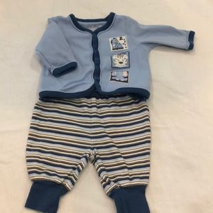Cute baby outfit. Blue jacket with stripped pants